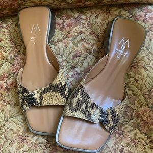 Marinelli sanke skin sandals.